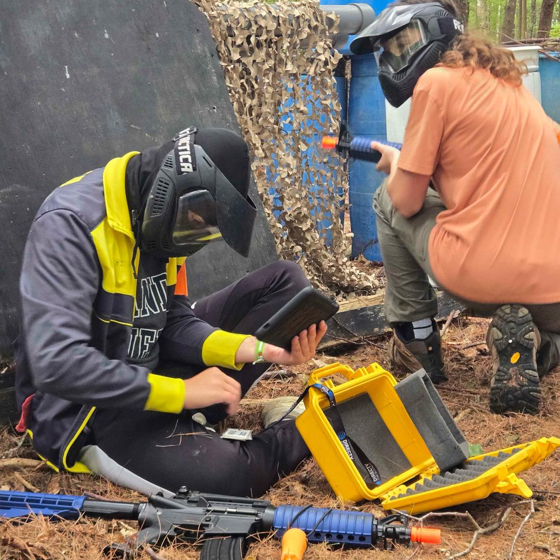 Players working together on an objective at the field