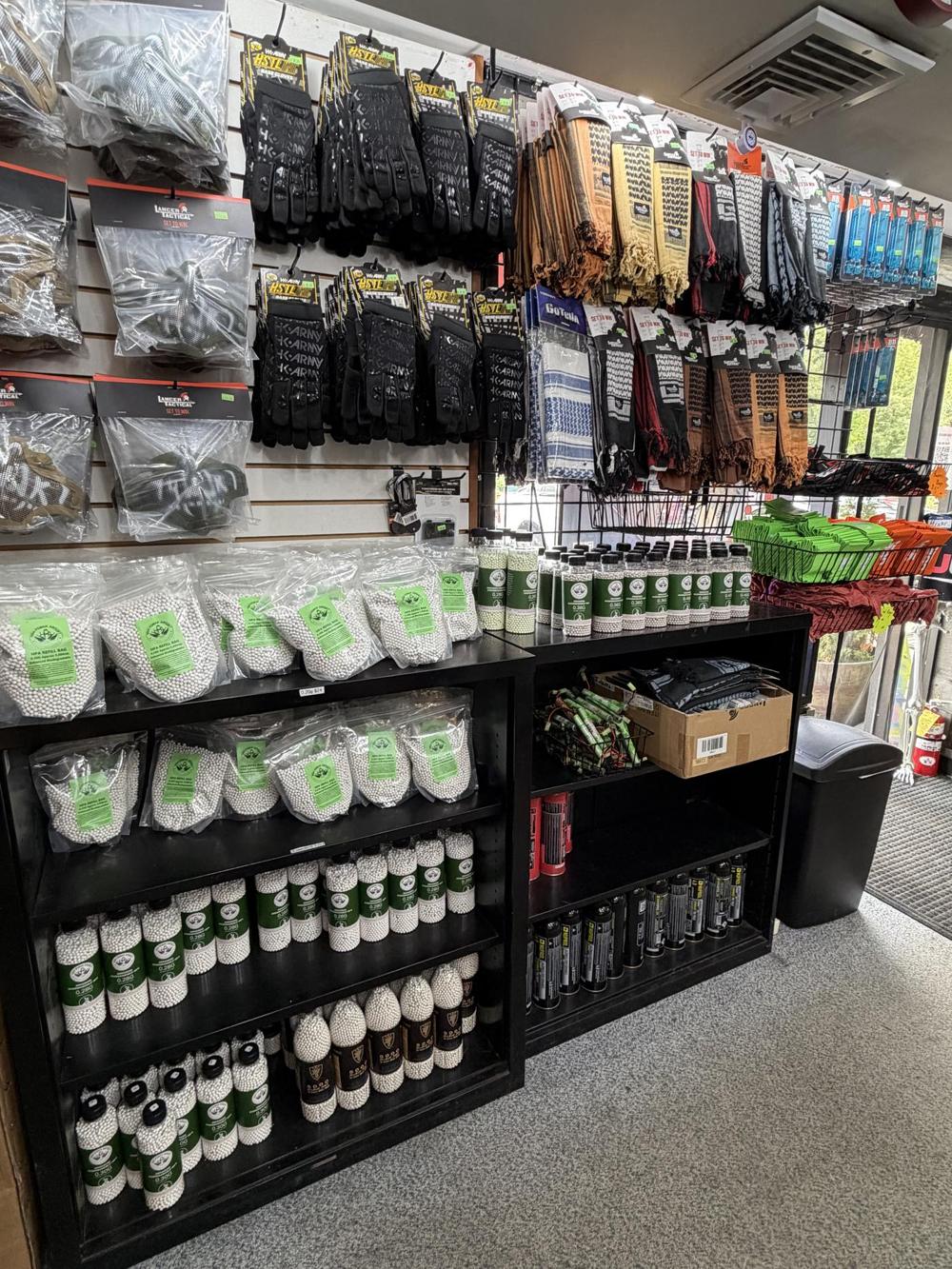 Gloves, slings, BBs and gas on the shelves of the UBG store